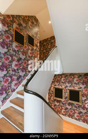 Wooden staircase in a modern apartment Stock Photo