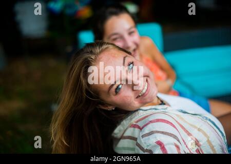 Backyard boho portrait of friends Stock Photo