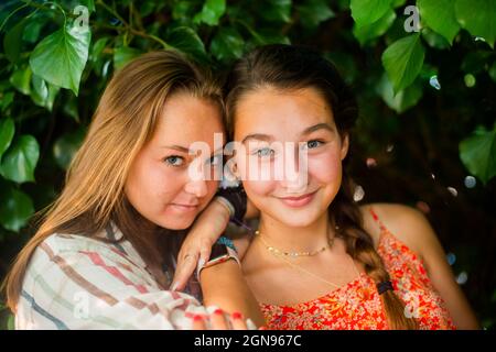 Backyard portrait of friends  laughing Stock Photo