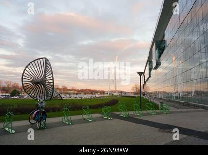 POZNAN, POLAND - Apr 11, 2016: Bicycle racks and park by the Galeria Malta shopping mall in Poznan Stock Photo