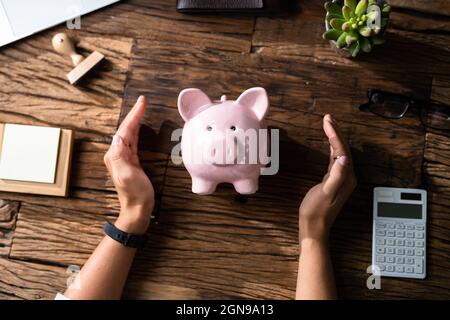Save Income Money And Pension. Insurance Advisor Protecting Stock Photo
