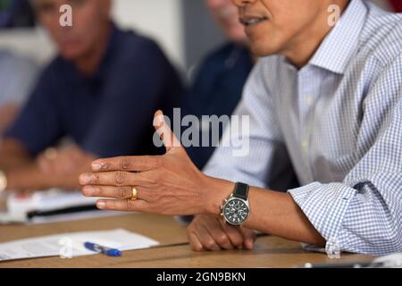 President Barack Obama gestures during a meeting on the response to the BP oil spill in the Gulf of Mexico, at Louis Armstrong International Airport in New Orleans, La., June 4, 2010. (Official White House Photo by Pete Souza) This official White House photograph is being made available only for publication by news organizations and/or for personal use printing by the subject(s) of the photograph. The photograph may not be manipulated in any way and may not be used in commercial or political materials, advertisements, emails, products, promotions that in any way suggests approval or endorsemen Stock Photo