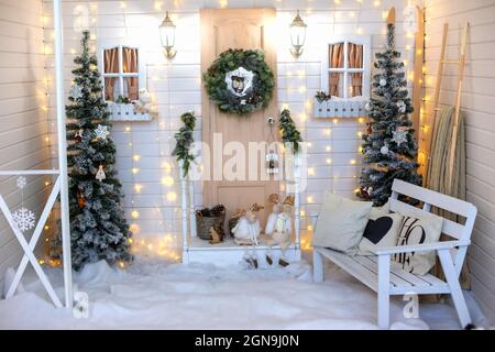 Christmas interior for a photo shoot in white colors. Stock Photo