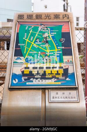 tokyo, japan - november 13 2021: Information signboard on the Bokutei street of Sumida ward depicting the pilgrimage of the seven gods of good luck on Stock Photo