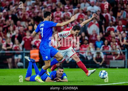 Copenhagen, Denmark. 07th, September 2021. Thomas Delaney (8) of Denmark and Eitan Tibi (21) of Israel seen during the UEFA World Cup qualifier between Denmark and Israel at Parken in Copenhagen. (Photo credit: Gonzales Photo - Robert Hendel). Stock Photo