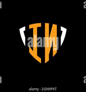 IN logo with shield white orange shape design template isolated on black background Stock Vector