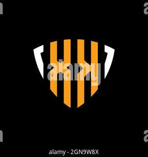 XK logo with shield white orange shape design template isolated on black background Stock Vector