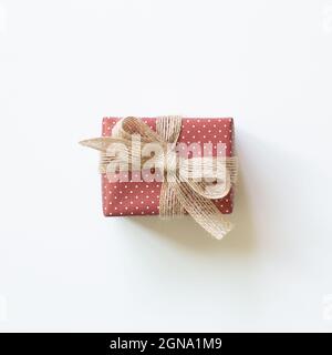 Dot pattern red gift box isolated on white background. top view, copy space Stock Photo