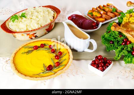 Many of traditional festive dishes on table for Thanksgiving Day. Stock Photo
