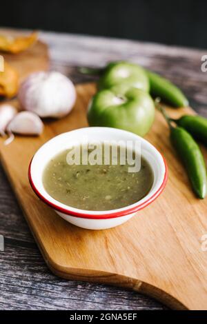 Mexican green sauce with chili peppers, green tomatoes and garlic in typical food of Mexico City Stock Photo