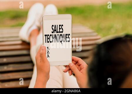 Text showing inspiration Sales Techniques. Business overview methods that sales professionals use to create revenue Voice And Video Calling Stock Photo