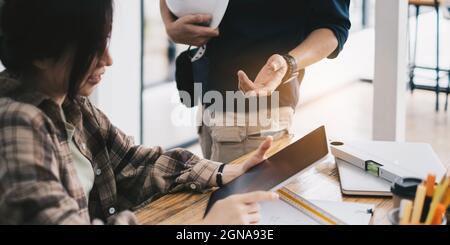 Engineer or architect doing model 3D the project on tablet with partner in offlice. Construction concept. Stock Photo