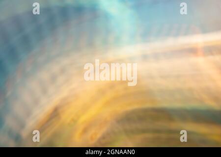 Multicolored abstract background of wavy lines and small waves in turquoise, yellow, brown tones. Photo effect. Imitation of the ocean and sand, top v Stock Photo