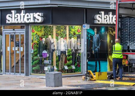 Slaters Menswear Suits goods delivery;  Shops, shoppers, shopping in Fishergate High Street Preston, UK Stock Photo