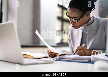 Tax Account Working With Public Records Ledger Stock Photo