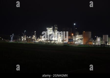 refinery of Shell and tanks of Mobil in the Pernis harbor in the port of Rotterdam Stock Photo