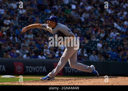 Denver CO, USA. 17th July, 2021. Los Angeles right fielder A.J. Pollock  (11) hits a home run during the game with the Los Angeles Dodgers and the  Colorado Rockies held at Coors