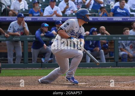 Denver CO, USA. 17th July, 2021. Los Angeles right fielder A.J. Pollock  (11) hits a home run during the game with the Los Angeles Dodgers and the  Colorado Rockies held at Coors