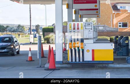 Brighton UK 24th September 2021 -  A Shell garage at Shoreham near Brighton has no fuel to sell this morning and all the pumps are out of use . A shortage of fuel tanker truck drivers delivering around the UK has caused problems this week   : Credit Simon Dack / Alamy Live News Stock Photo