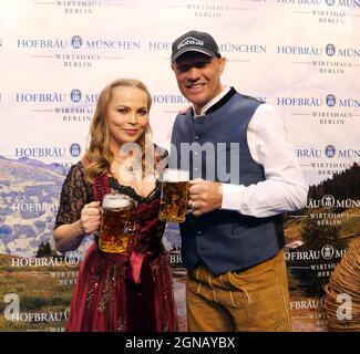 Berlin, Germany. 17th Sep, 2021. Boxer Regina Halmich and boxer Axel Schulz celebrate at the opening of the Oktoberfest in the Hofbräu pub at Alexanderplatz. Credit: XAMAX/dpa/Alamy Live News Stock Photo