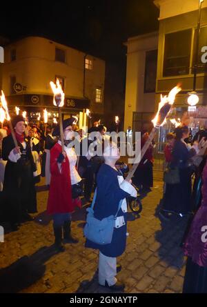 LEWES, UNITED KINGDOM - Nov 05, 2018: People in costume in procession at night with lit torches celebrating Guy Fawkes Bonfire Night Stock Photo