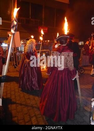 LEWES, UNITED KINGDOM - Nov 05, 2018: People in costume in procession at night with lit torches celebrating Guy Fawkes Bonfire Night Stock Photo