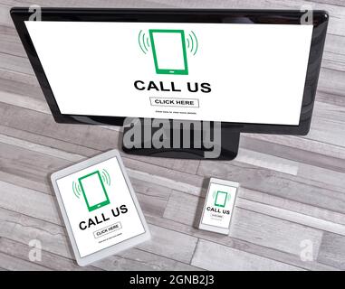 Phone support concept shown on different information technology devices Stock Photo