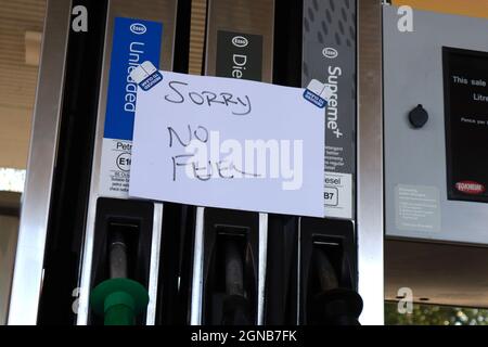 Tenterden, Kent, UK. 24 September, 2021. No fuel in the only petrol station for miles around in the town of Tenterden, Kent. Pictured is hand written signs saying sorry no fuel on all pumps. Photo Credit: Paul Lawrenson /Alamy Live News Stock Photo