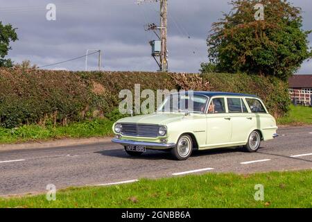 1963 60s sixties yellow Vauxhall Victor estate 1508cc petrol 4dr en-route to Capesthorne Hall classic August car show, Cheshire, UK Stock Photo