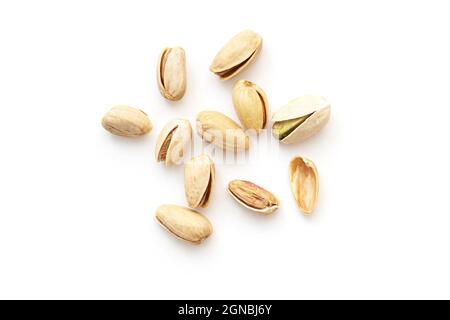 Top view of pistachios isolated on white. Heap of Pistachios. Stock Photo