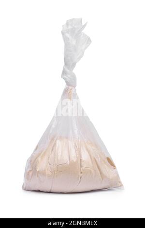 Transparent plastic bag with powder isolated on white background Stock Photo
