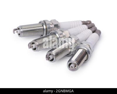 Four car iridium spark plug isolated over white background Stock Photo