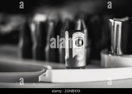 Selective focus shot of a socket wrench adapter in a toolbox Stock Photo