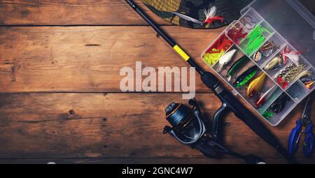 Fishing tackle lures and tackle box Stock Photo - Alamy