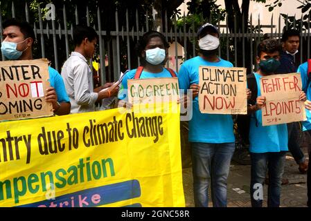 Climate activists and supporters display placards during a global climate strike, part of the Fridays for Future, in Dhaka, Bangladesh, on September 24, 2021. Credit: Mamunur Rashid/Alamy Live News Stock Photo