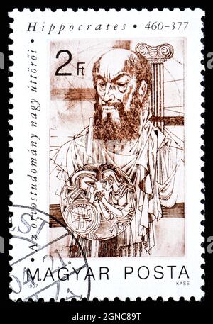 HUNGARY - CIRCA 1987: Stamp printed in Hungary shows a portrait of Hippocrates Stock Photo