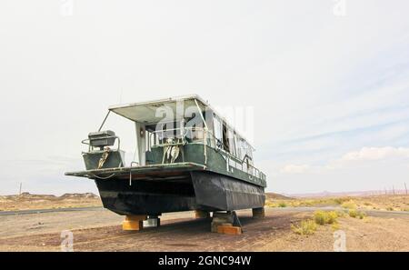 Abandoned Houseboat On High Desert Highway Stock Photo