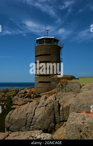 An external view of a German Naval World War Two communications tower at Corbiere on the scenic coast of Jersey in the Channel Islands. Stock Photo