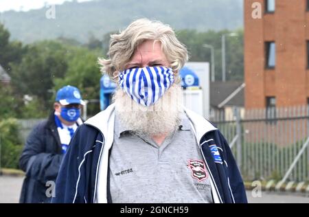 Fans arrive early in the rain for  the Premier League match between Brighton and Hove Albion and Leicester City at the American Express Community Stadium , Brighton, UK - 19th September 2021 - Photo Simon Dack/Telephoto Images Editorial use only. No merchandising. For Football images FA and Premier League restrictions apply inc. no internet/mobile usage without FAPL license - for details contact Football Dataco Stock Photo