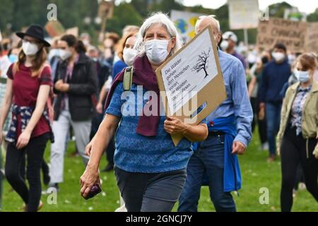 Heidelberg, Germany - 24th September 2021: Elderly lady with protest sign at Global Climate Strike demonstration Stock Photo