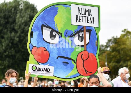 Heidelberg, Germany - 24th September 2021: Protest sign with angry earth of organization dedicated to preserving nature and environment called BUND at Stock Photo