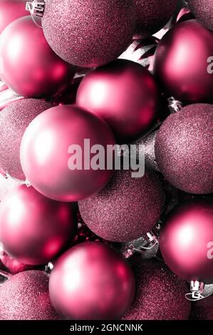 Glitter Christmas balls red background. Holiday concept. Stock Photo