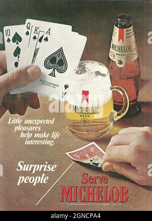 Vintage advertisement of Michelob beer 1980s 1970s Heineken bottle with Heineken glass paper adver magazine advert Stock Photo