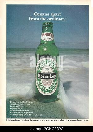 Vintage advertisement of Heineken beer 1980s 1970s Heineken bottle with Heineken glass paper adver magazine advert Stock Photo