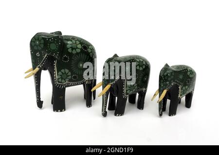 Elephant family, wooden elephants, three elephants, hand-painted wooden elephants, handicraft, African elephants, souvenir Africa, painted elephants, Stock Photo