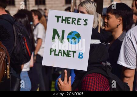 London, UK. 24th Sep, 2021. A protester holds a 'There's No Planet B' placard during the demonstration in Parliament Square. Hundreds of people marched in the capital as part of the Fridays For Future global climate strike, calling on the government to act urgently on the climate crisis. Credit: SOPA Images Limited/Alamy Live News Stock Photo