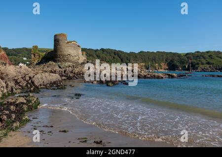 View of Fort Charles, civil war castle, from North sands beach, Salcombe, at low tide on a lovely sunny summers day, with lovely blue sky. Stock Photo