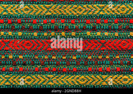 Material with patterns and shapes. Knitting. Knitted texture in different colors and shades. Fabric Stock Photo
