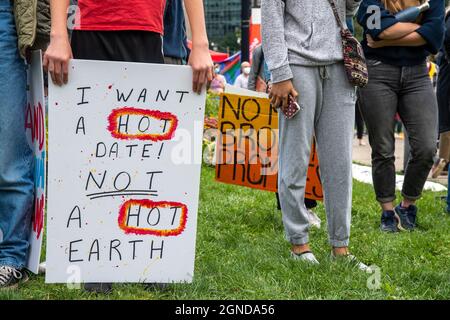 Sign reading 'I want a hot date, not a hot planet' during the Global Climate March organized by Fridays For Future in front of the Provincial Legislat Stock Photo