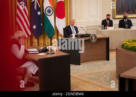 Washington DC, USA. 24th Sep, 2021. United States President Joe Biden hosts a Quad Leaders Summit with Prime Minister Narendra Modi of India, left, Prime Minister Scott Morrison of Australia, and Prime Minister Suga Yoshihide of Japan (both not pictured) in the East Room of the White House in Washington, DC on Friday, September 24, 2021. Credit: Sarahbeth Maney/Pool via CNP /MediaPunch Credit: MediaPunch Inc/Alamy Live News Stock Photo